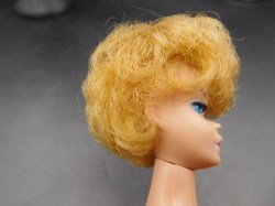 blonde barbie bubble red suit face a